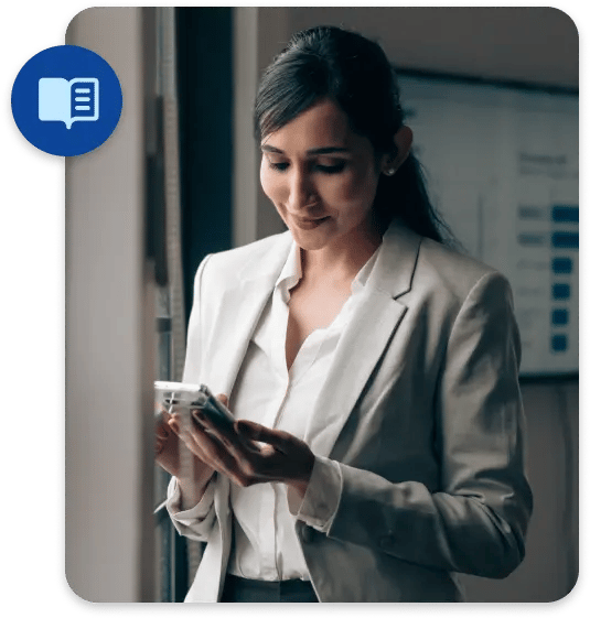 ShowingTime+ Guides Header - Realtor Working on Mobile Device ShowingTime+ Guides Header - Realtor Working on Mobile Device
